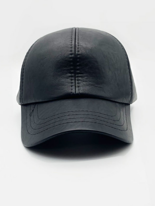 Product shot of the faux leather cap. This leather look faux leather cap has a curved tongue and  black accented stiching. The picture shows the front of the cap.