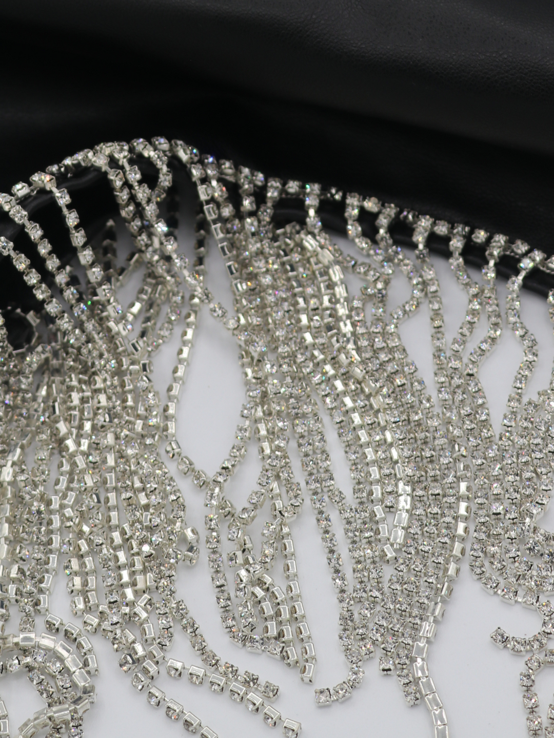 Close up of the diamante tassels. The diamantes demonstrate the sparkle of the diamante tassels. 