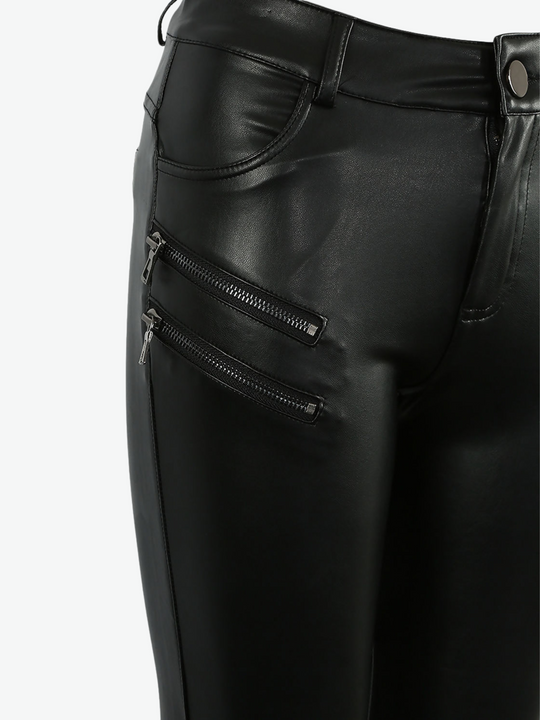 Ghost manequin wears a soft faux leather trousers with front button fastening and multiple zips. The picture shows a close up of one of the legs of the trousers. The two exposed side zips can be seen.