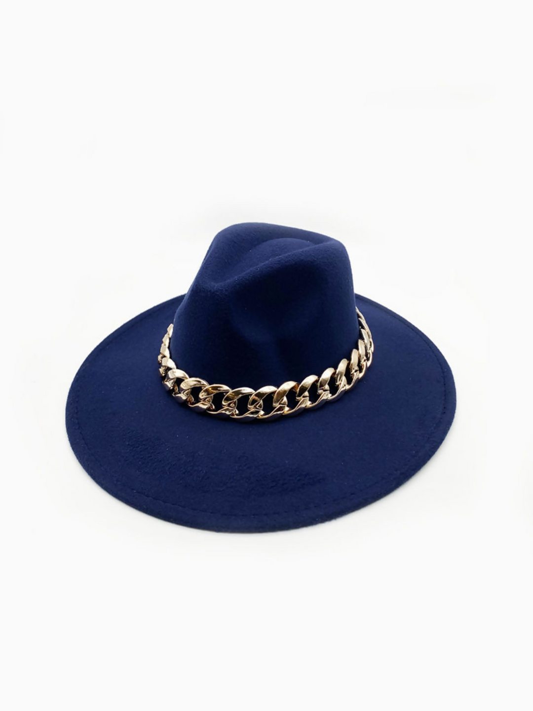 A luxe navy felt fedora hat with chunky gold chain design at the centre of the hat. The whole of the front of the hat can be seen.