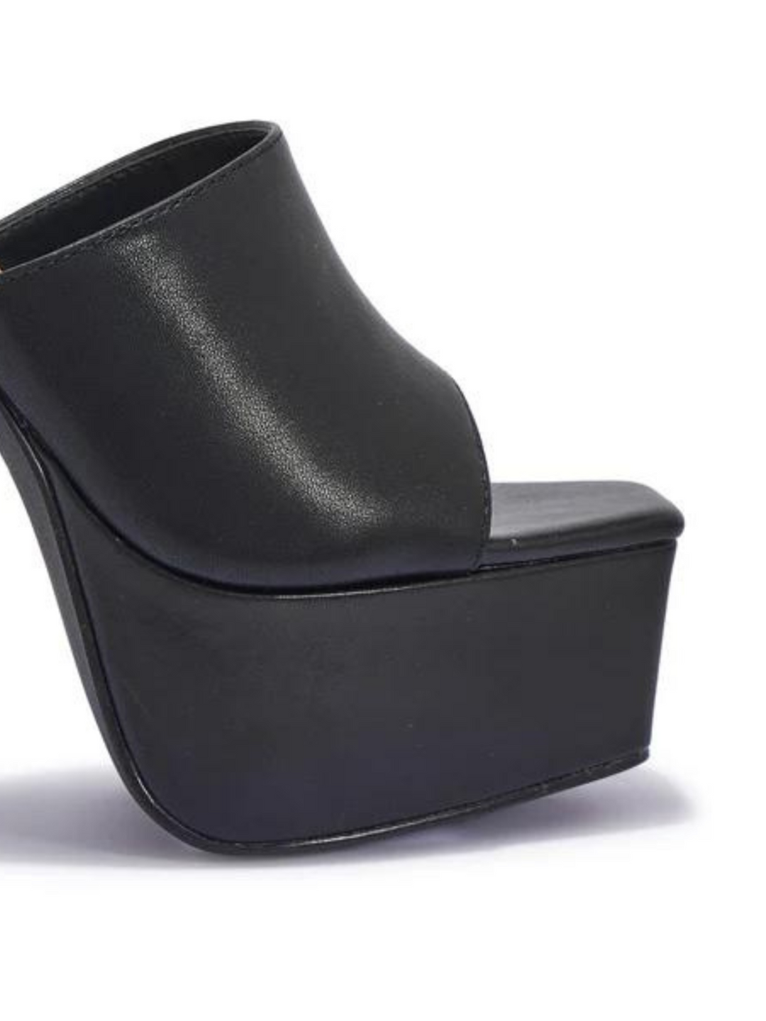 Black heeled mules that have a thick platform base and stiletto shoes. The picture shows the thick platform and the shoes band. 